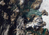 Iceberg Towers Over Greenland Village